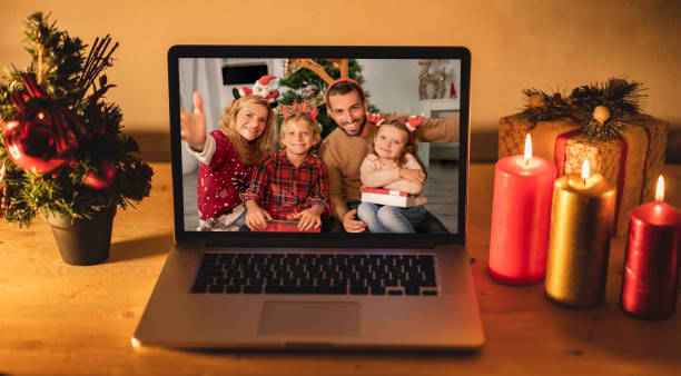 istock computer with family video call christmas 1443940186