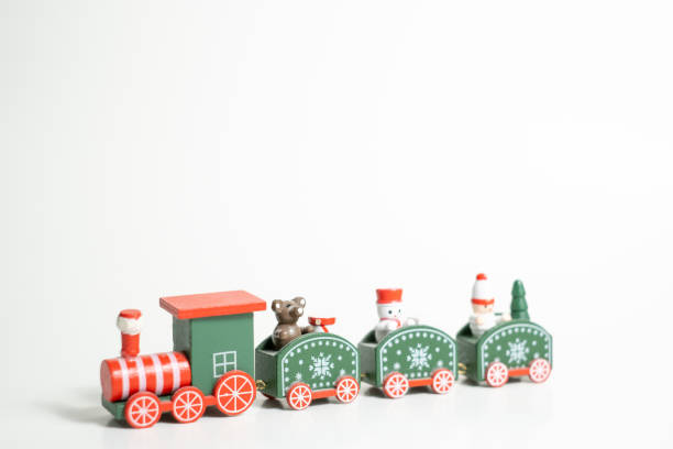 istock christmas train toy on white blackground 1443941026