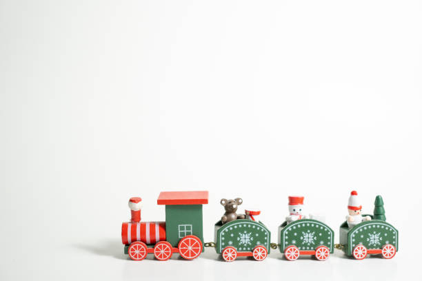 istock christmas train toy on white blackground 1443941033