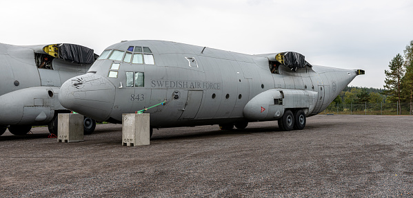 Gothenburg, Sweden - september 24 2022: Two decommissioned Swedish Air Force Lockheed C-130 Hercules on a parking lot.