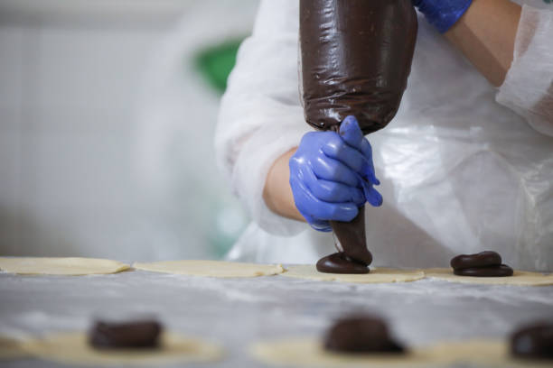 istock Handmade Chocolate Dessert Production, Chef in The Kitchen 1443943941