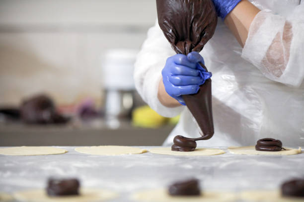 istock Handmade Chocolate Dessert Production, Chef in The Kitchen 1443943968