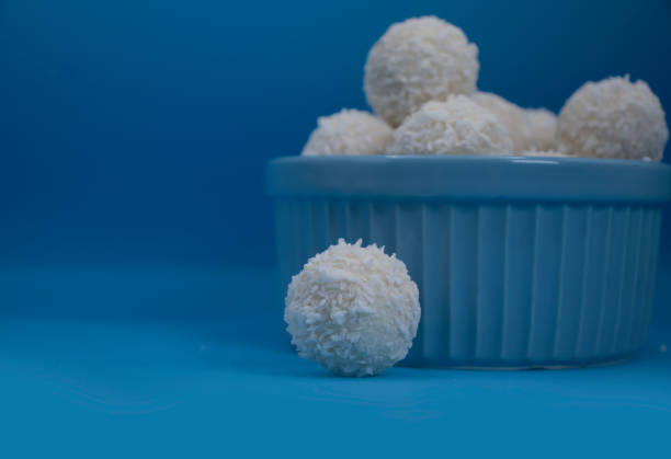 istock Coconut candies on a colored background 1443946241