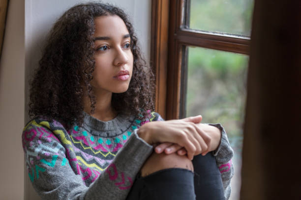 sad mixed race african american teenager woman - depression imagens e fotografias de stock