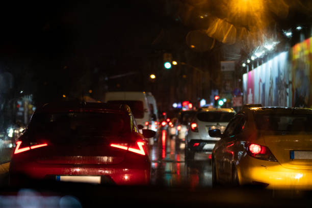 istock Car traffic on a rainy night 1443948457