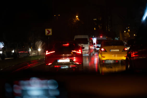 istock Car traffic on a rainy night 1443948643