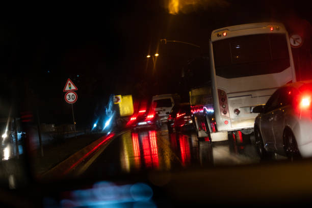 istock Car traffic on a rainy night 1443948738