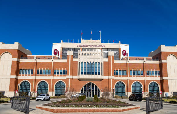 The Switzer Center in front of The Gaylord Family Oklahoma Memorial Stadium on the campus of the University of Oklahoma Norman, OK - November 2022: The Switzer Center in front of The Gaylord Family Oklahoma Memorial Stadium on the campus of the University of Oklahoma university of oklahoma stock pictures, royalty-free photos & images