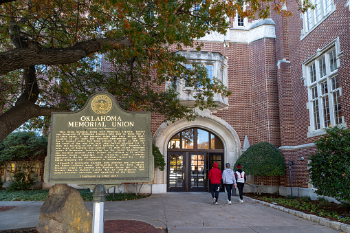 Norman, OK - November 2022: Students walk into the Oklahoma Memorial Union on the University of Oklahoma campus
