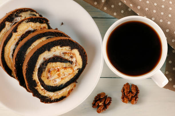 istock Sweet pastry roll. Traditional breakfast. Chocolate Swiss Roll 1443957914
