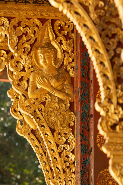 istock Gilded decoration at Wat Xieng Thong temple, Luang Prabang, Laos 1443962940