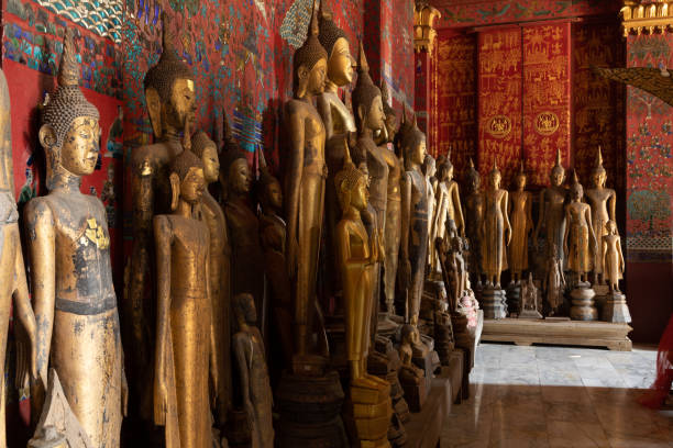 istock Ancient Buddha statues, Wat Xieng Thong temple, in Luang Prabang, Laos 1443963003