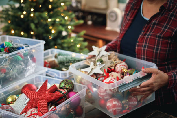 istock Decorating Christmas Tree with Ornaments and Christmas Lights 1443964882