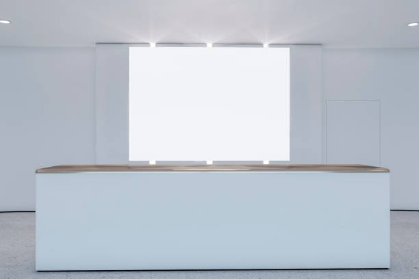 istock Modern concrete office lobby interior with empty white mock up poster. Waiting area and hotel concept. 3D Rendering. 1443965098