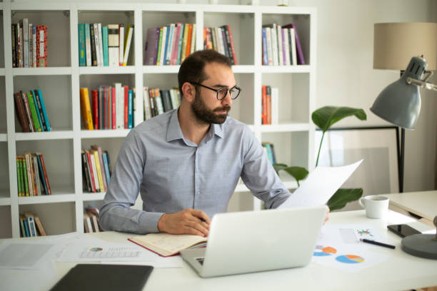 istock Businessman working from home office 1443967289