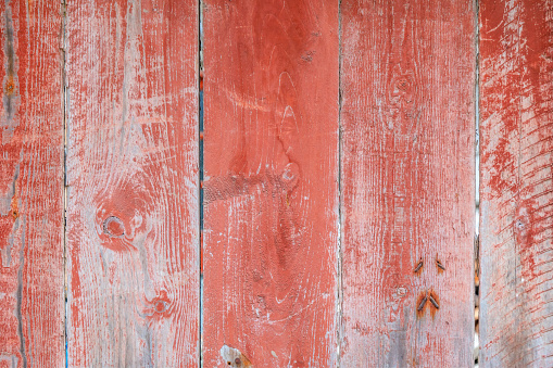 Red wood texture with natural patterns