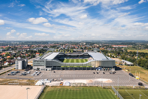 Horsens, Central Jutland, Denmark - August 2022:  Aerial summer skyline view of Forum Horsens Arena (CASA Arena Horsens), home stadium for AC Horsens football club.