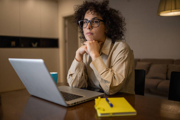 istock Young woman working from home 1443970744