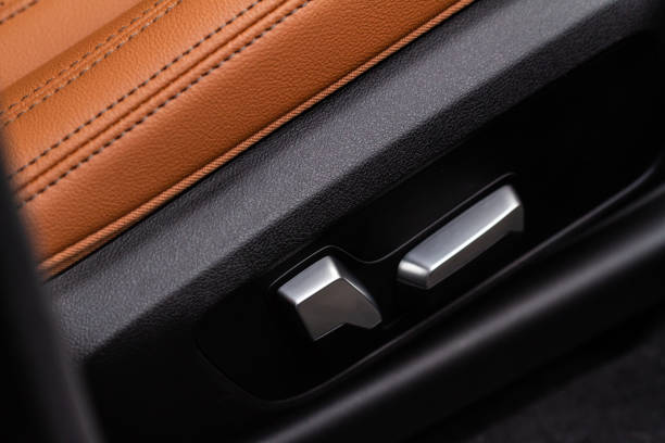 istock Electric car seat adjustment control panel close up view. Adjustable car seat position. Car interior. 1443973058