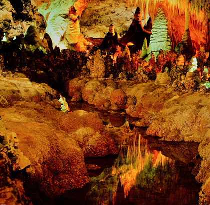 Carlsbad Caverns - National Park are hidden in the Chihuahuan Desert in souther New Mexico have stunning stalactites hanging from the roof of caverns.