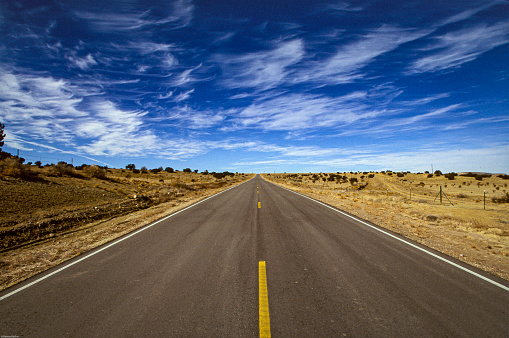 The open spaces and ability to drive forever without another person on the road under the blue sky in New Mexico. Destination unknown!