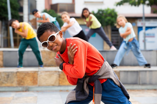 istock Boy hip hop dancer exercising outdoors 1443985130