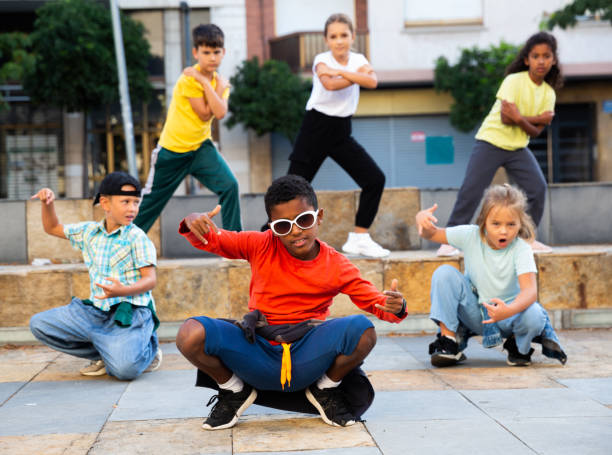 istock Modern tweenagers performing street dance choreography 1443985140