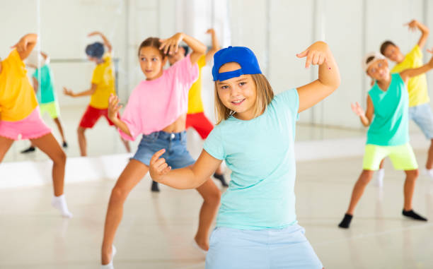 istock Boys and girls dancing hip-hop dance 1443985878
