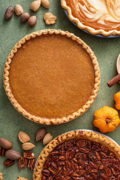 istock Traditional Thanksgiving pumpkin pie with flaky crust 1443990663