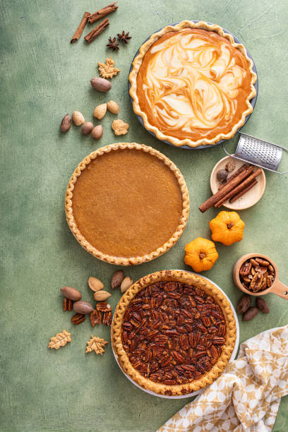 istock Traditional fall Thanksgiving pies, pumpkin and pecan pie 1443990667