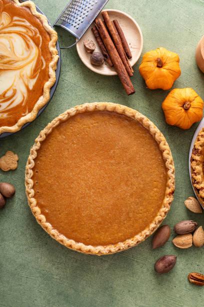 istock Traditional Thanksgiving pumpkin pie with flaky crust 1443990670