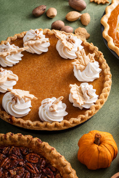 istock Traditional Thanksgiving pumpkin pie with flaky crust 1443990679