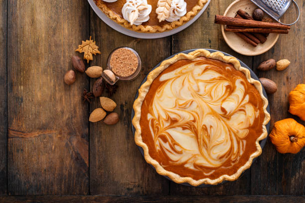 istock Pumpkin cheesecake swirl pie, Thanksgiving dessert idea 1443990704