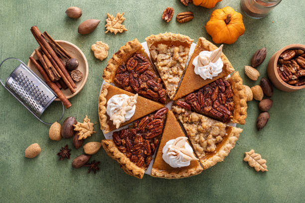 istock Traditional fall Thanksgiving pie slices, pumpkin and pecan pie 1443990730