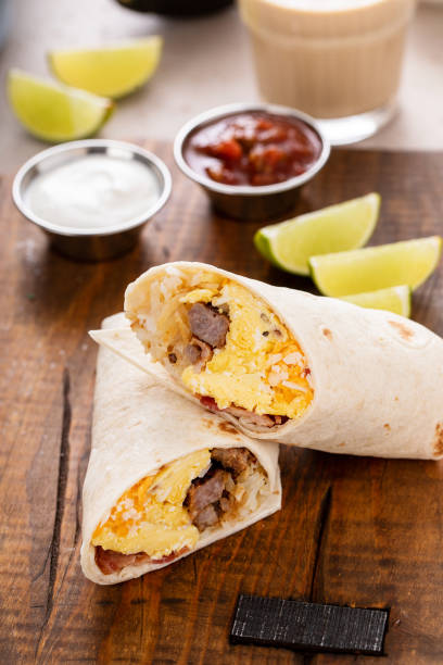 istock Breakfast burrito with sausage, eggs, hashbrown and cheese 1443991791
