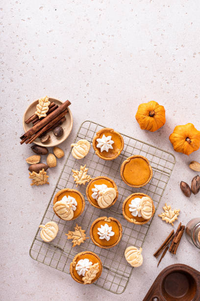 istock Mini pumpkin pies with wipped cream and cinnamon 1443991993