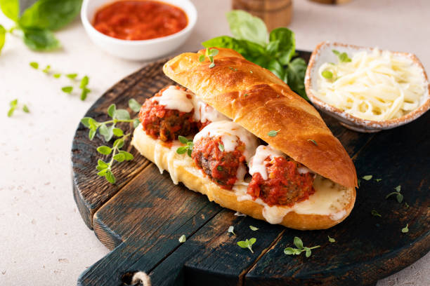 istock Meatball sub sandwich with marinara and mozzarella 1443992082