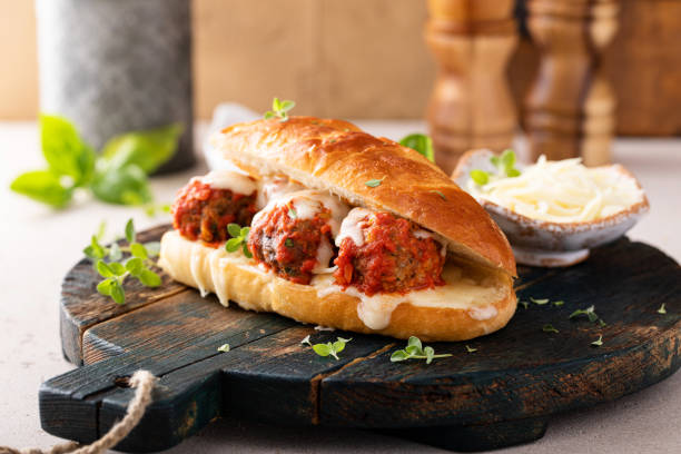 istock Meatball sub sandwich with marinara and mozzarella 1443992099