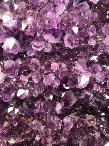 A purple amethyst shines and glitters