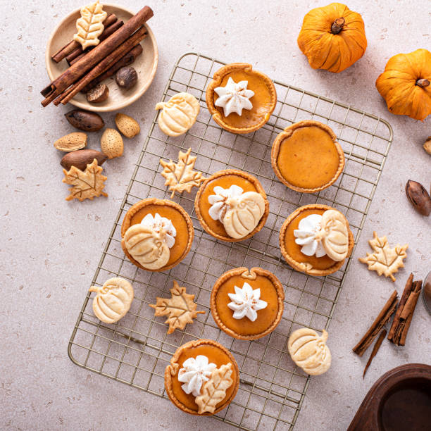 istock Mini pumpkin pies with wipped cream and cinnamon 1443993018