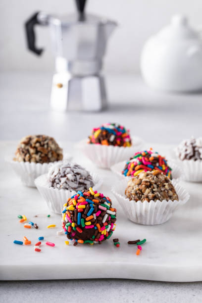 istock Homemade chocolate truffles covered with sprinkles and nuts 1443993537