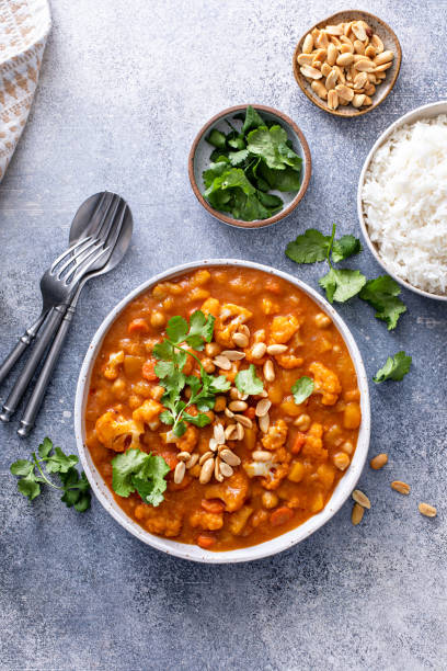 istock Vegan curry with cauliflower, chickpeas and butternut squash 1443993594