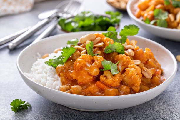 istock Vegan curry with cauliflower, chickpeas and butternut squash 1443993599