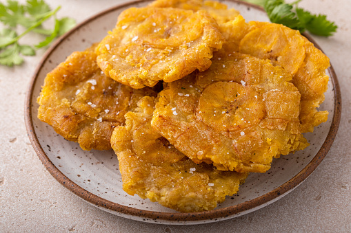 Tostones, traditional Carribean dish, twice fried green plantains