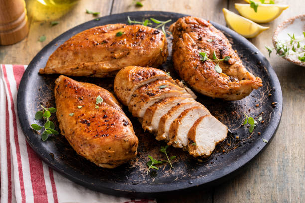 istock Roasted or seared chicken breast with herbs 1443993863
