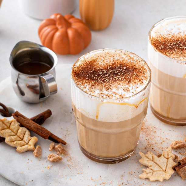 istock Pumpkin spice latte topped with milk foam and dusted with cinnamon 1443993884