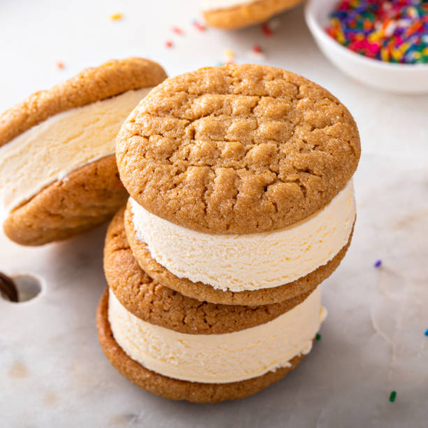 istock Ice cream and cookies sandwiches stacked on the table 1443993897