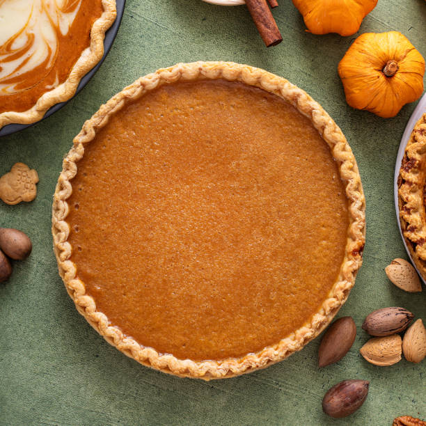istock Traditional Thanksgiving pumpkin pie with flaky crust 1443993915