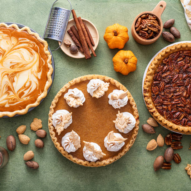 istock Traditional fall Thanksgiving pies, pumpkin and pecan pie 1443993916