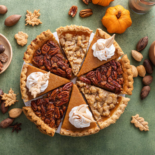 istock Traditional fall Thanksgiving pie slices, pumpkin and pecan pie 1443993926